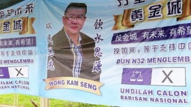Photo of “投國陣，等於支持中國” 萬里望候選人海報惹爭議