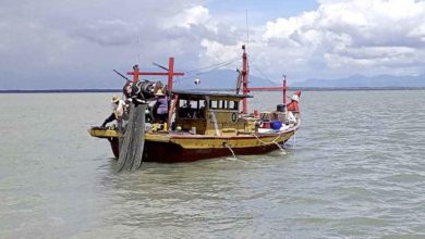 Photo of 越界作業 漁船及漁夫被扣查