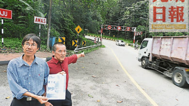 Photo of 無視告示牌限高杆 重型車仍出入水池路