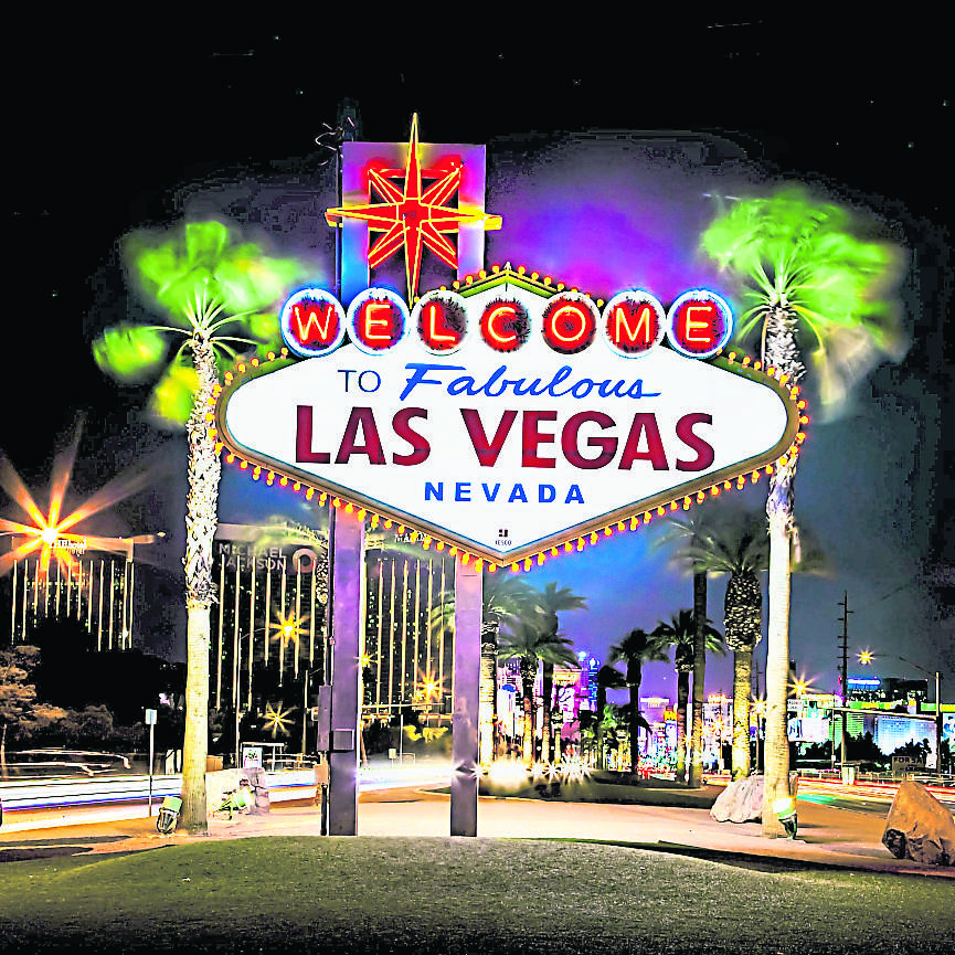 las-vegas-sign-at-night-596570141-592d94915f9b585950c6effa