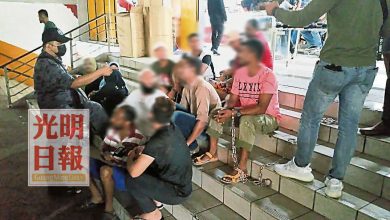 Photo of 65執法員突擊大山腳 扣14外勞開600元罰單