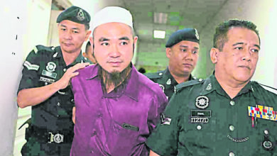 Photo of 控非法匯款 華穆認罪3萬保外