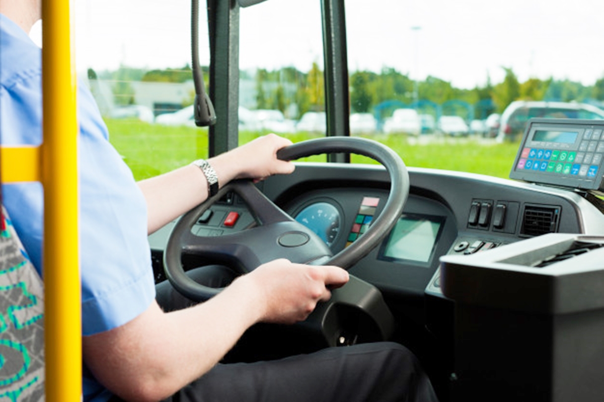 driver-sitting-bus_79405-11811