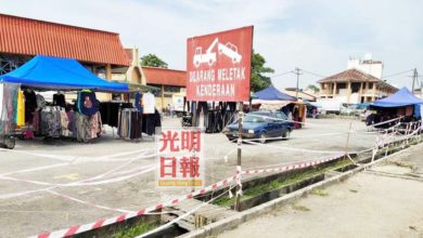 Photo of 防違規者扯警戒線進入  販商嚴守居林巴剎