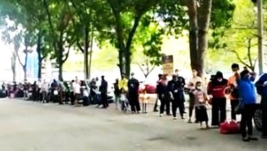 Photo of 疑患及緊密接觸者登記戴環 評估中心人龍不見盡頭
