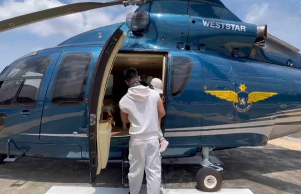 藝人夫婦直接租用直升機，攜帶2名孩子飛往海島度假。