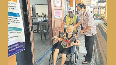 Photo of 輪椅代步堅持出門 86歲老婦不錯過投票
