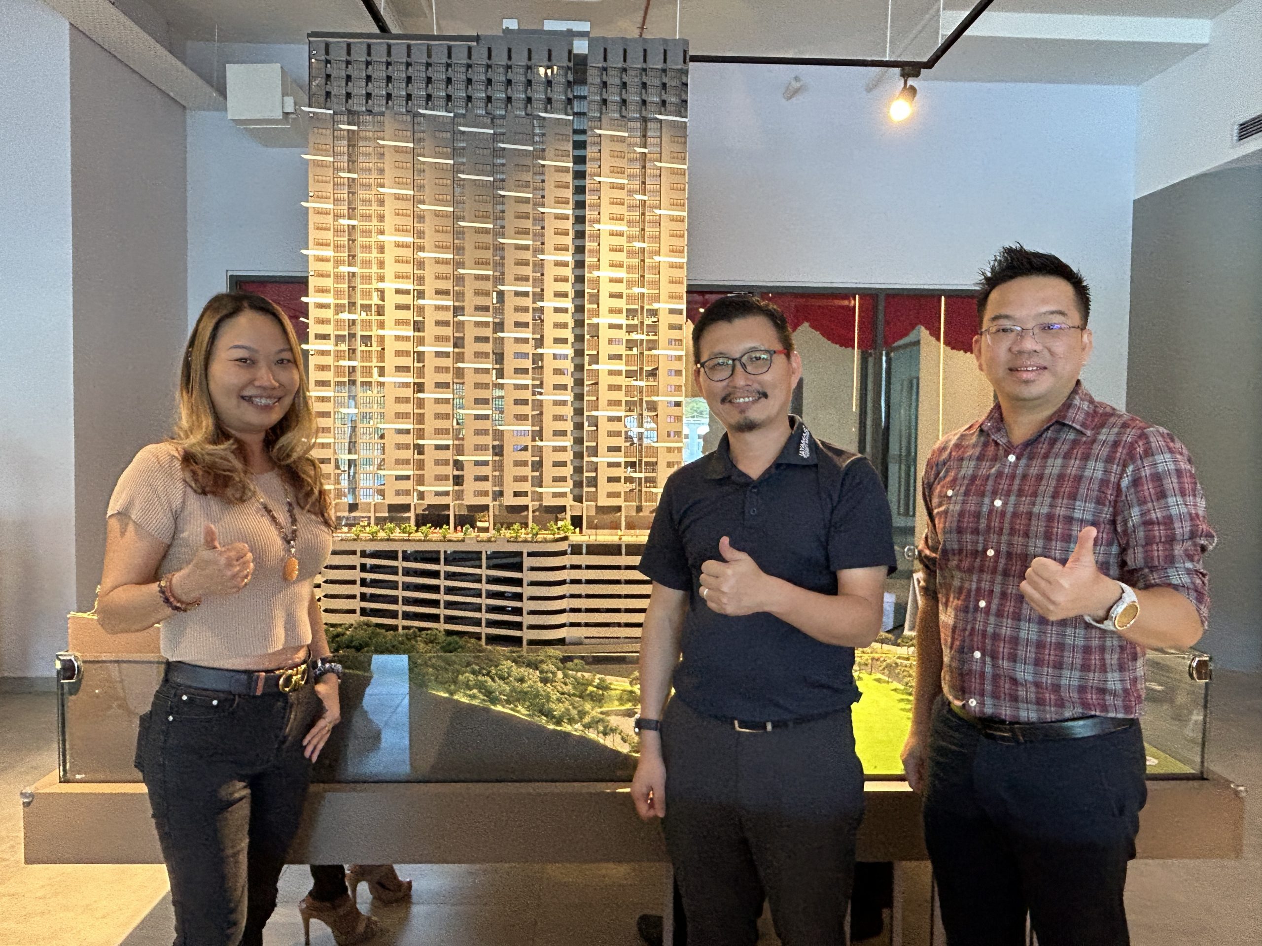 Jayamas Property Group's deputy general manager Huang Bingxiong (right), general manager Huang Weizhong (middle) and sales and marketing director Hong Junjun (left).