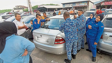 Photo of 女車主遺留後車廂 民防隊助開鎖取車匙