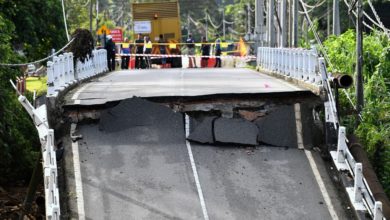 Photo of 仕林河山洪爆發沖斷3橋 露營區21人受困一晚獲救