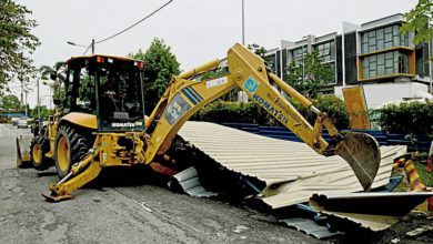 Photo of 住戶佔用保留路段 非法停車棚被拆