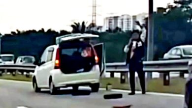 Photo of 停右侧快车道换轮胎 男司機被轰“谋财害命”