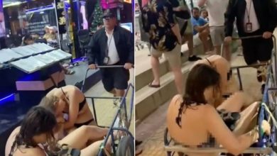 Photo of 2美女醉倒路边 警用推车送回酒店