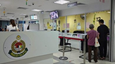 Photo of 女大学生取护照 被官员索RM5