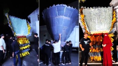 Photo of 25万奖金捆成花束 商家搞噱头引热议