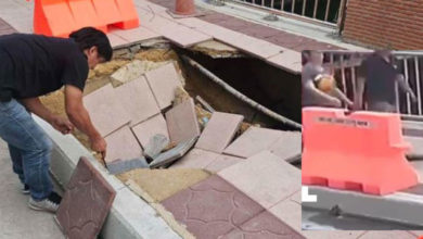 Photo of 牵手散步人行道  情侣瞬间坠入坑洞