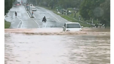 Photo of 峇丹绒拉务路清晨大雨 闪淹积水大塞车