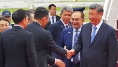 Photo of 习近平抵马 安华亲自接机
