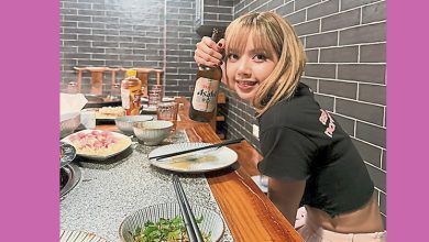 Photo of BLACKPINK Lisa米兰品尝麻辣火锅 桌上冰红茶掀惹抢购潮
