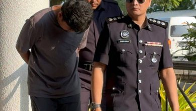 Photo of 被控抢劫71岁妇女 快递员不认罪