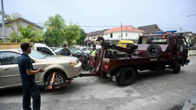 Photo of 修车厂占用公共空间 市厅拖2车 开27罚单