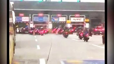 Photo of 无视摩多专用通道 骑士成群闯收费站