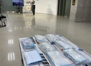 Photo of 手机包裹藏毒闯关 马台联手捕黑帮成员