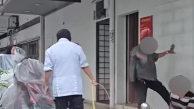 Photo of 流浪汉熟睡银行外五脚基 保安用水喉向流浪汉射水 管理人更数次狠踢流浪汉