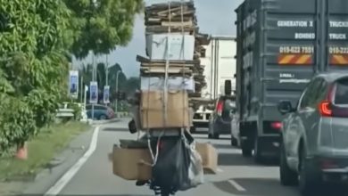 Photo of 摩多堆高“纸皮塔”上路 超载到比车还高