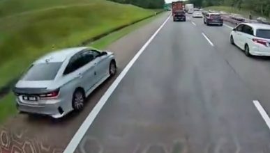 Photo of 滥用紧急车道 汽车借罗里掩护终被拦下