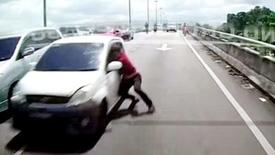 Photo of 高架桥警匪追逐战 刑警遭拖行画面曝光