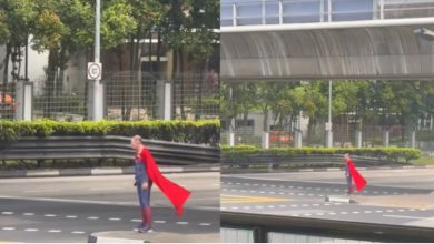 Photo of 超人等绿灯过马路 网民: 他飞不动了?
