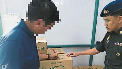 Photo of 杂货店有条件卖津贴食油 执法员假扮顾客上门捉