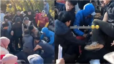 Photo of 为抢拍美景互不相让  登山客山顶爆冲突
