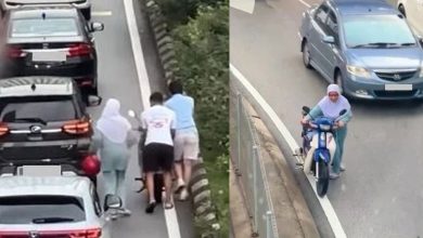 Photo of 大马路边温情! 妇女摩多抛锚雨中推行 2男路过挺身相助