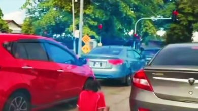 Photo of 残疾者穿梭车道乞讨 民众吁当局采取行动
