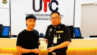 Photo of 10年有效期 威省首人领新版护照