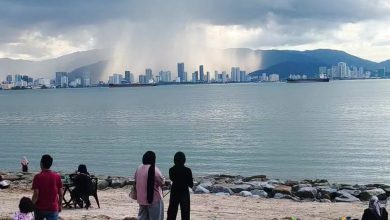 Photo of 一边下雨一边放晴 北海民众惊见槟岛绝美雨幕