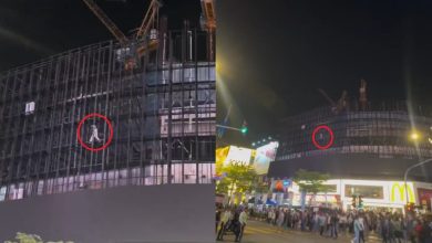 Photo of 只为打卡拍照 男子爬上施工楼